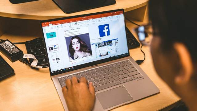 Laptop open to a PowerPoint presentation
