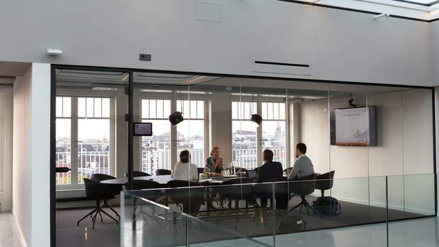People sitting in a meeting room